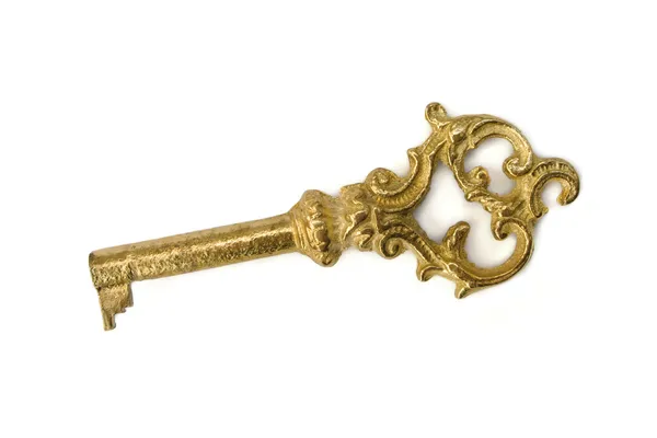 Старый желтый ключ — стоковое фото