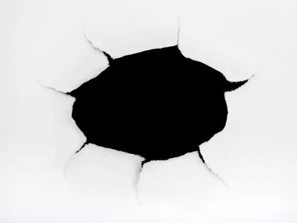 Hole on paper surface — Stock Photo, Image