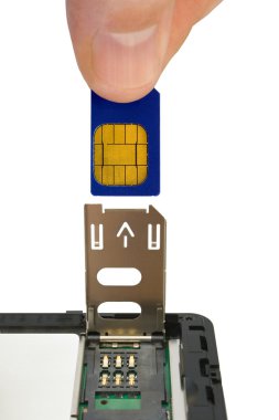 Hand install sim card to mobile phone clipart