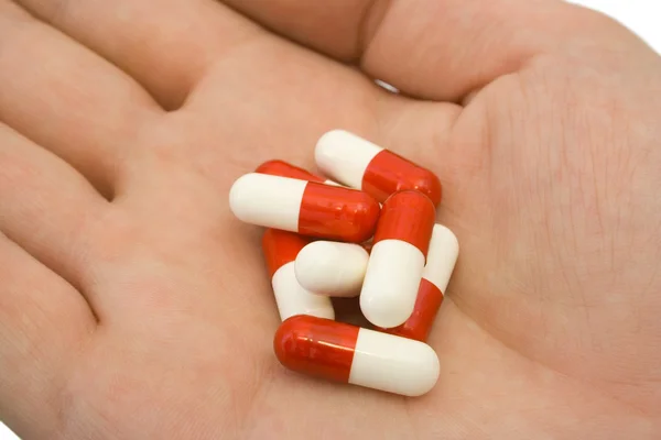Pills on hand, close-up — Stock Photo, Image