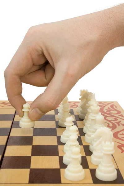 Pawn in de hand en schaakbord — Stockfoto