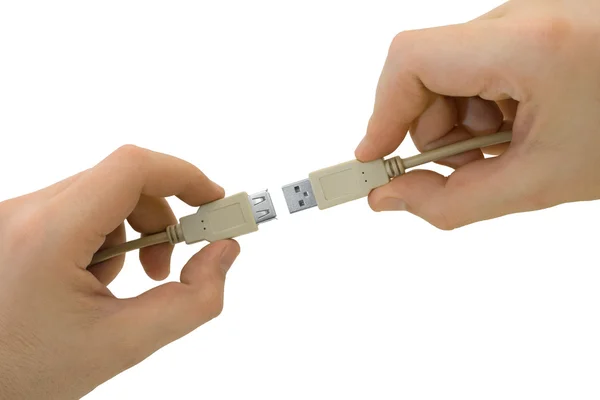 Mãos com conectores USB — Fotografia de Stock