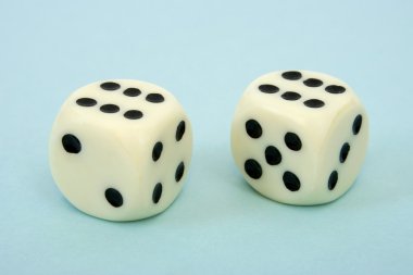 Two dices on blue background clipart