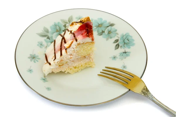 Торт на тарілці і виделці — стокове фото
