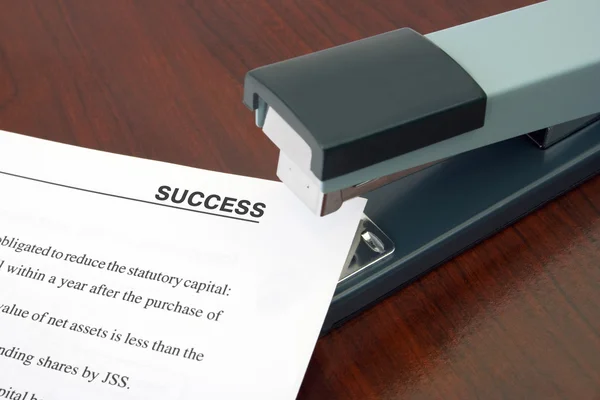 Office stapler and document — Stok fotoğraf