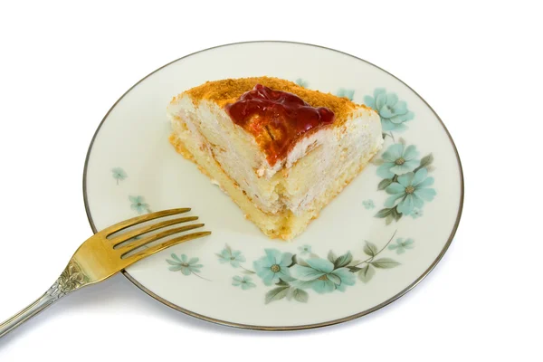 Gâteau sur assiette et fourchette — Photo