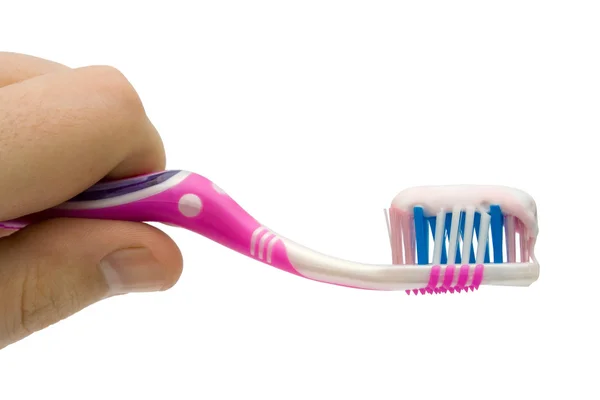 Cepillo de dientes en la mano , — Foto de Stock