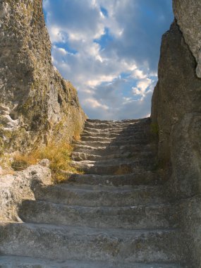 Old stone staircase to sky clipart