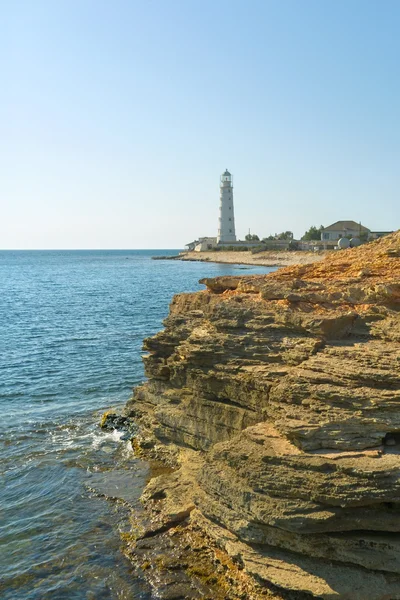 灯台、海とロック — ストック写真