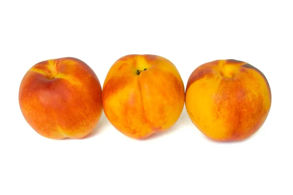 Tre persikor — Stockfoto