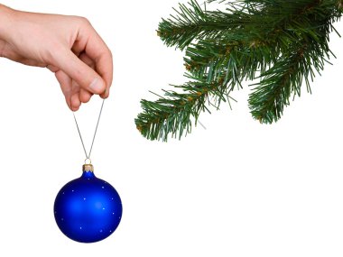 Noel ağacı, el ve top