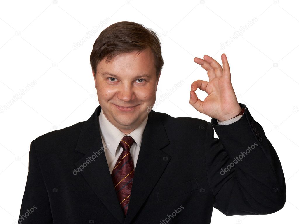 Businessman holding up an OK sign