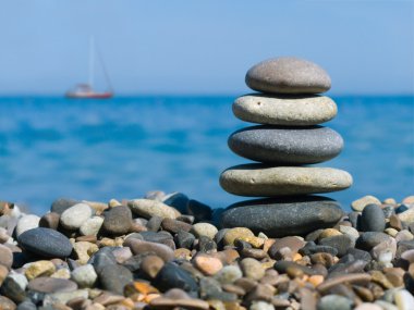 Stack of stones and yacht clipart