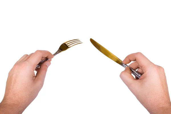 Messer und Gabel in der Hand — Stockfoto