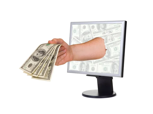stock image Hand with money and computer monitor