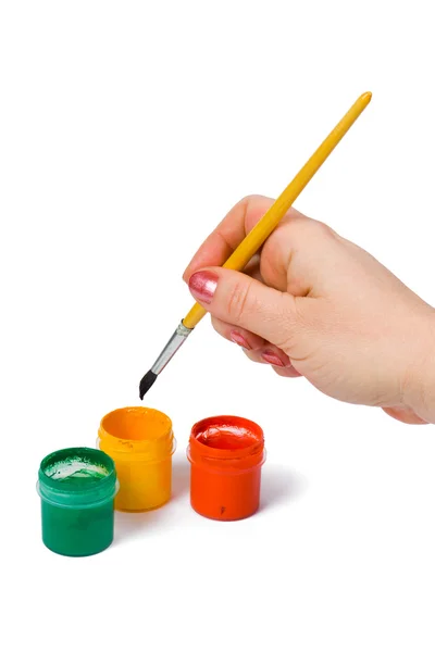 Hand med pensel — Stockfoto