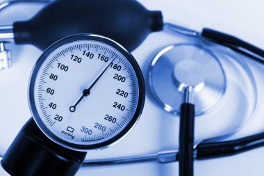 Scale of pressure and stethoscope clipart