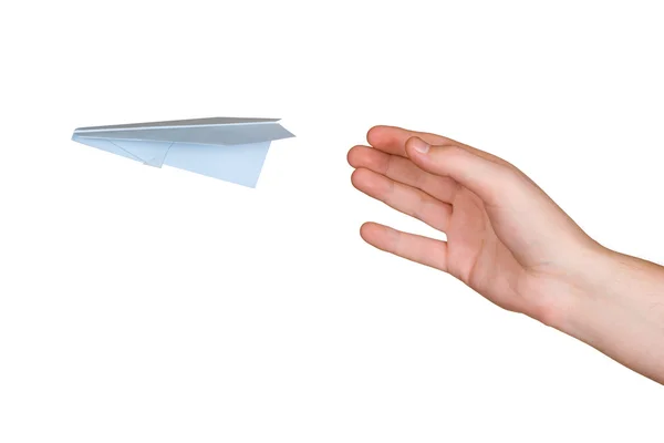 Χέρι και πετώντας χάρτινο αεροπλανάκι — Φωτογραφία Αρχείου