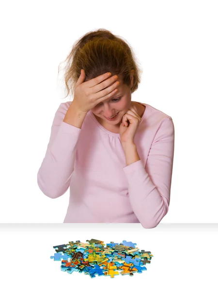 Girl and puzzle — Stock Photo, Image