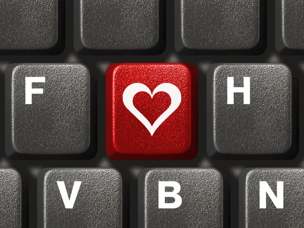 Клавиатура компьютера с клавишей любви — стоковое фото