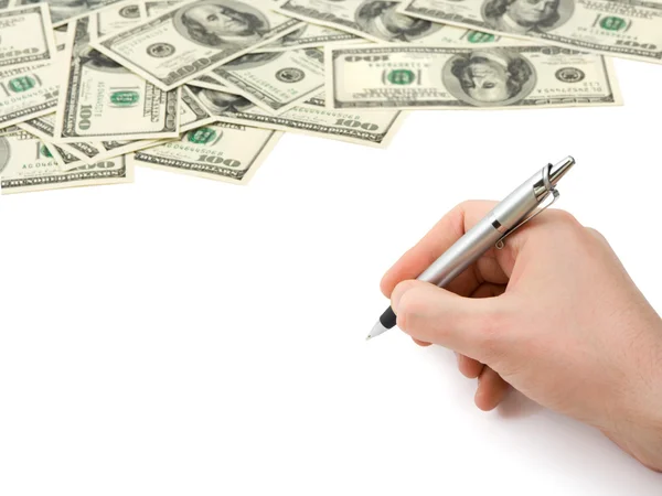 Mão com caneta e dinheiro — Fotografia de Stock
