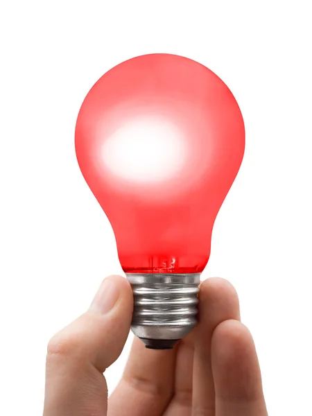 Röd lampa i handen — Stockfoto