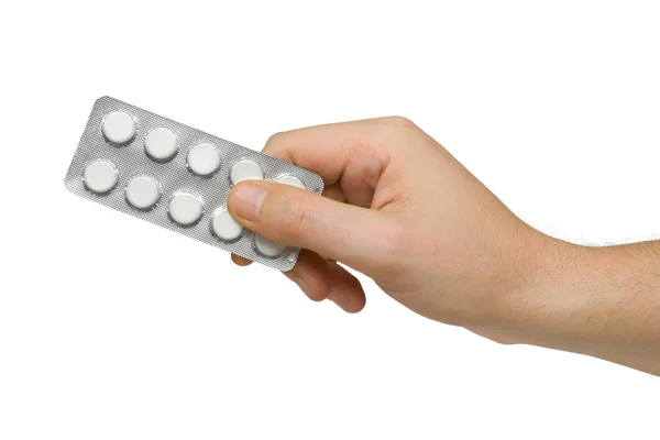 Mão dando pílulas — Fotografia de Stock
