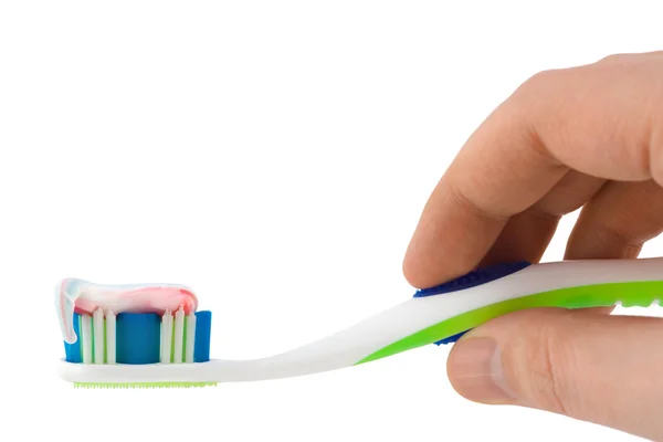 Hand with toothbrush — Stock Photo, Image