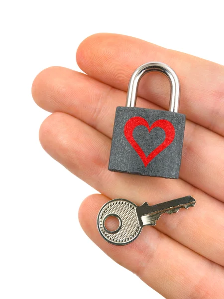 Vergrendelen met hart en de sleutel in de hand — Stockfoto