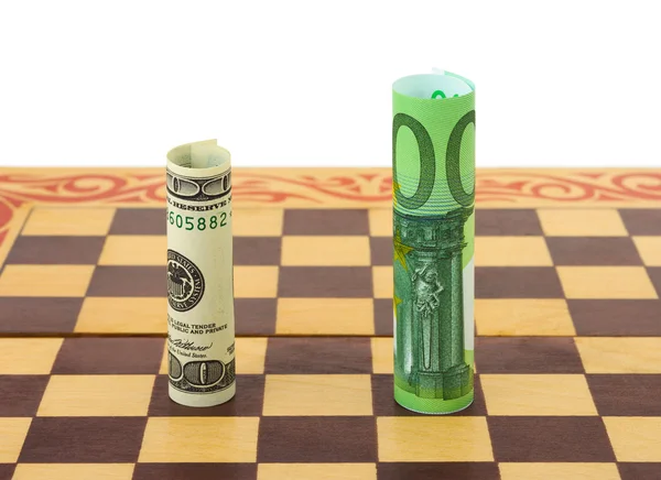 Dollar and euro on chess board — Stock Photo, Image