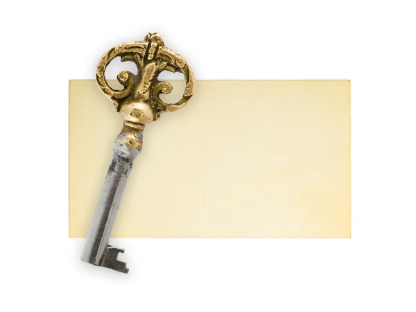 Retro sleutel op papier kaart — Stockfoto