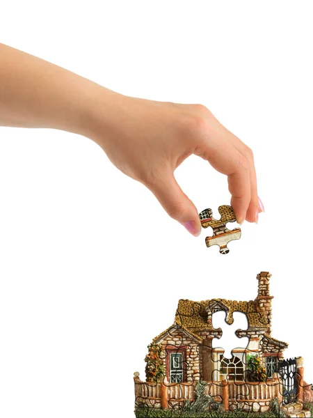 Hand and puzzle house — Stock Photo, Image