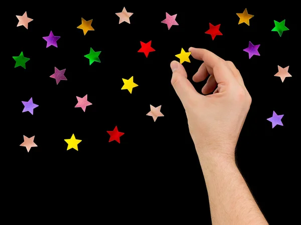Hand put star to night sky — Stock Photo, Image