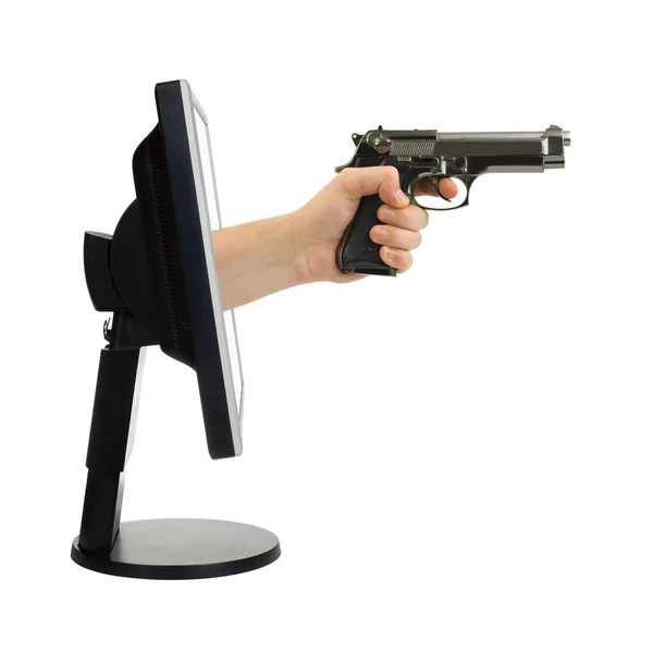 Számítógép-monitor és a kéz a fegyver — Stock Fotó