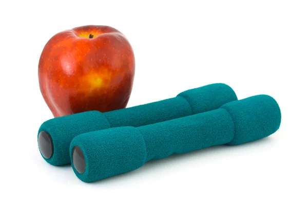 Apple and dumbbells — Stock Photo, Image