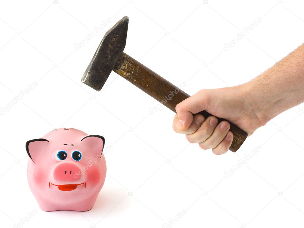 Hand with hammer and piggy bank