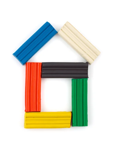 Casa feita de massa multicolorida — Fotografia de Stock