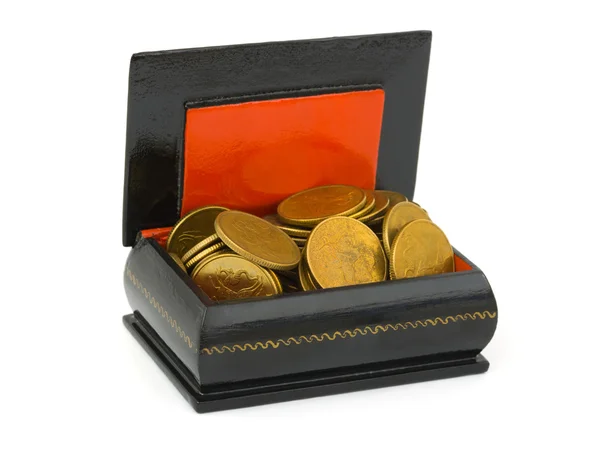 Dinero de oro en el pecho — Foto de Stock