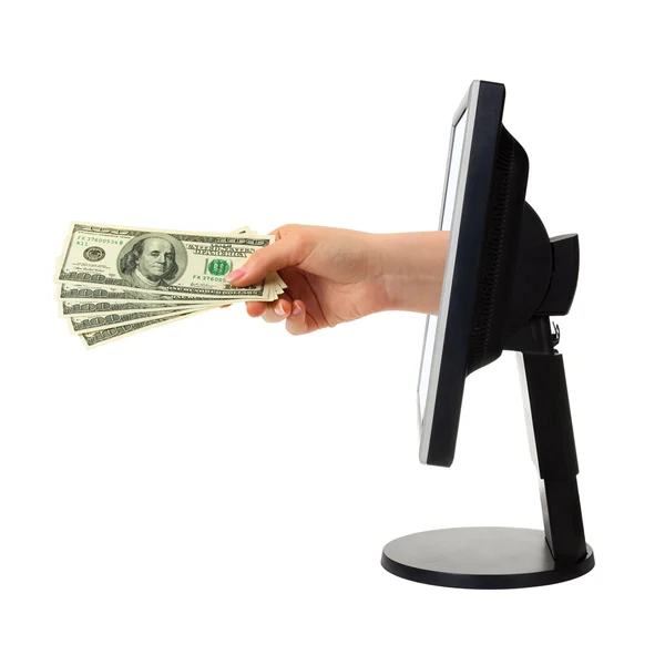 stock image Hand with money and computer monitor