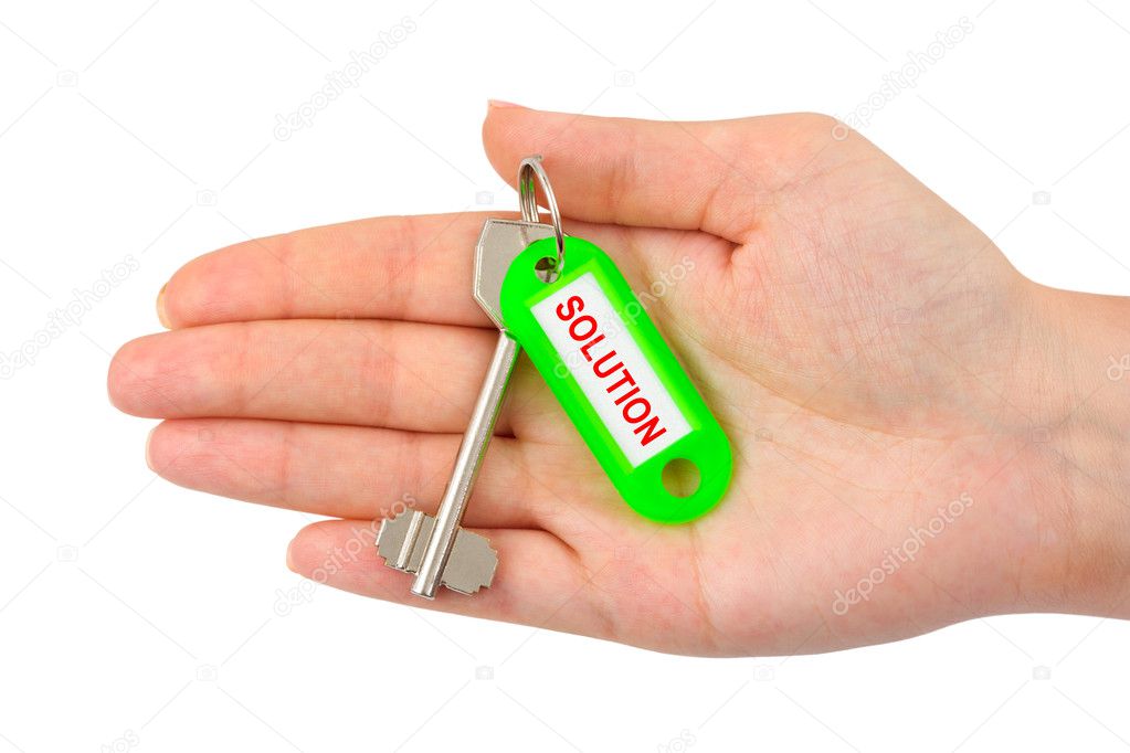 Hand and key with label Solution
