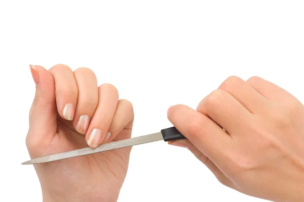 Handen en manicure nagelvijl — Stockfoto