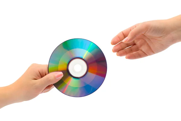 Руки с диском компьютера — стоковое фото