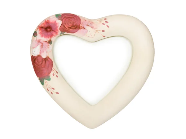 Rámeček ve tvaru srdce s květinami — Stock fotografie