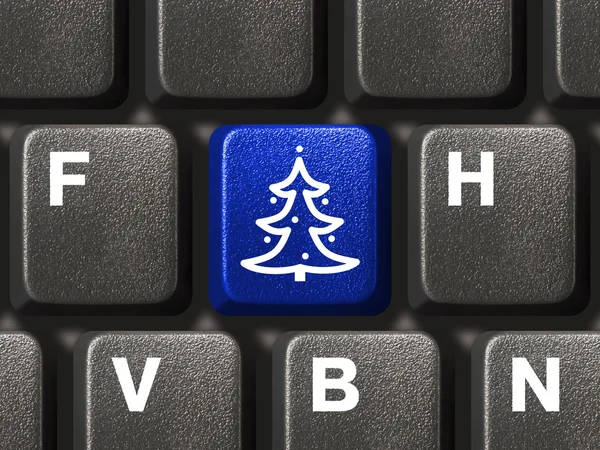 Toetsenbord van de computer met kerstboom sleutel — Stockfoto