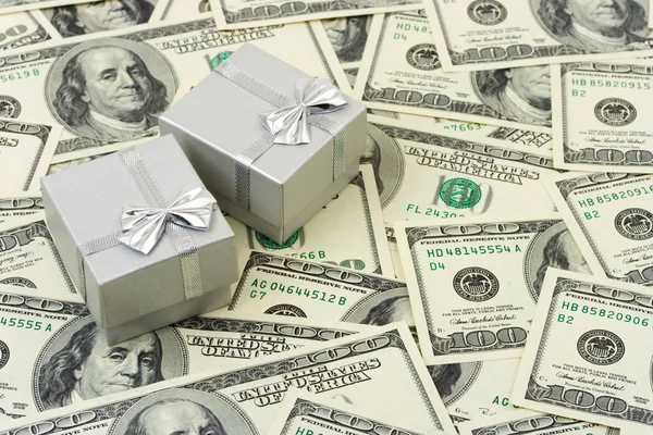 Gifts on money background — Stock Photo, Image