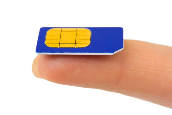 Cartão SIM no dedo — Fotografia de Stock
