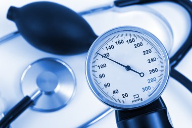 Scale of pressure and stethoscope clipart