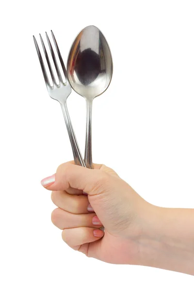 Fork and spoon in hand — Stock Photo, Image