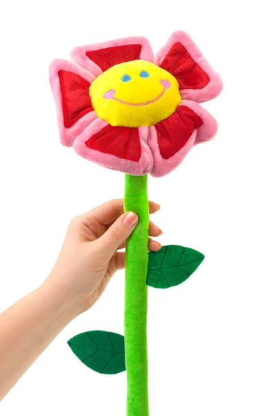 Toy blomma i handen — Stockfoto