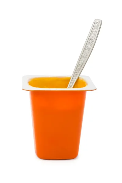 Fruity yoghurt and spoon — Stock Photo, Image